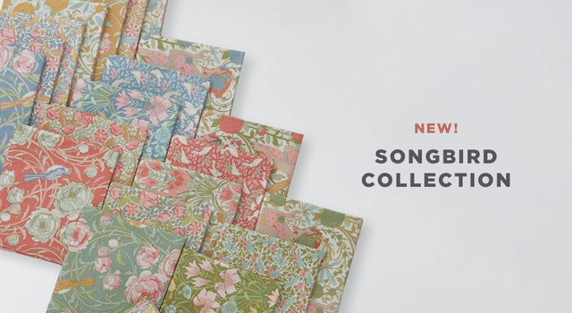 a stack of floral fabric fat eights from the Songbird fabric collection by Tilda Fabrics.