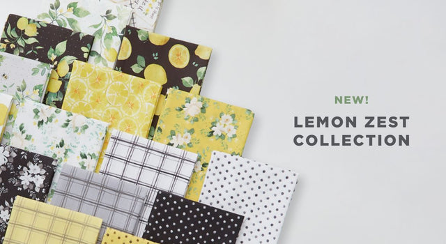 a selection of yellow, black and white fat quarter prints from the lemon zest fabric collection.