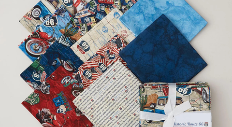 A fat quarter bundle of road maps, signs, cars, and more.