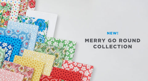 A selection of colorful fat quarter fabrics from the Merry Go Round fabric collection.