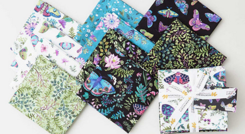 a fat quarter bundle of pretty florals and  butterfly fabric prints from the nightshade fabric collection.