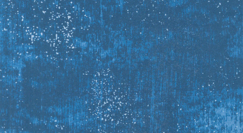 A 108" wide backing of blue colors with small scattered white dots.