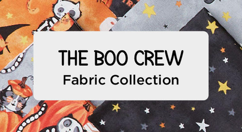 Black and orange animals in costumes among pumpkins, one of several cute halloween fabric prints from The Boo Crew fabric collection by Northcott.