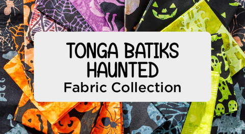 a selection of halloween fat quarter fabrics from the tonga batiks haunted collection.
